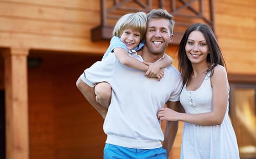 Young happy family buying a house with a VA loan